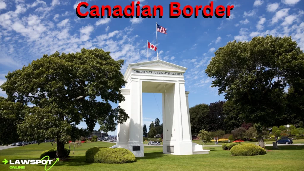 A view of the Canadian border monument, symbolizing the crossing point between the U.S. and Canada, with flags flying high. Can you drive to Alaska? Yes, and this is a key stop on your route.